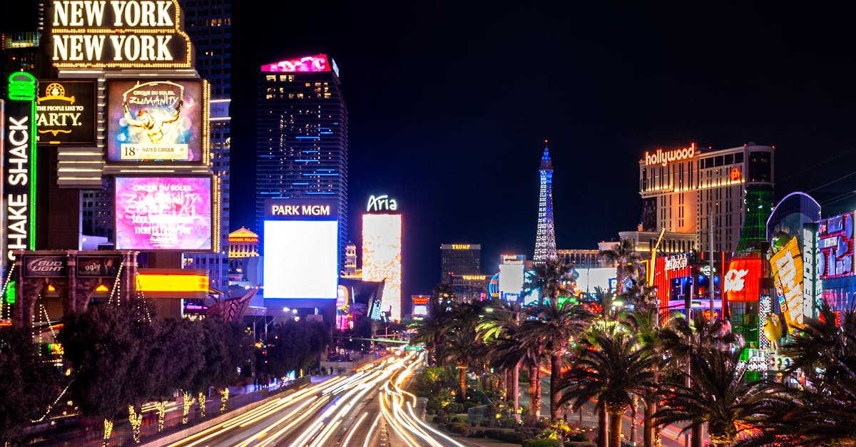 Experience the vibrant neon lights and nightlife of the iconic Las Vegas Strip at night.